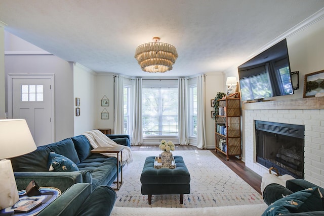 204 Stonecrest Cir, Ringgold, GA 30736 - living room with a brick fireplace, ornamental molding, and wood finished floors
