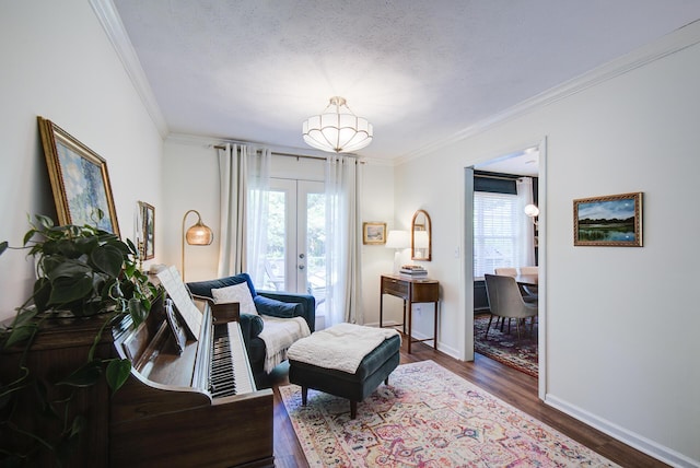 204 Stonecrest Cir, Ringgold, GA 30736 - sitting room with french doors, crown molding, dark wood-style flooring, a chandelier, and baseboards