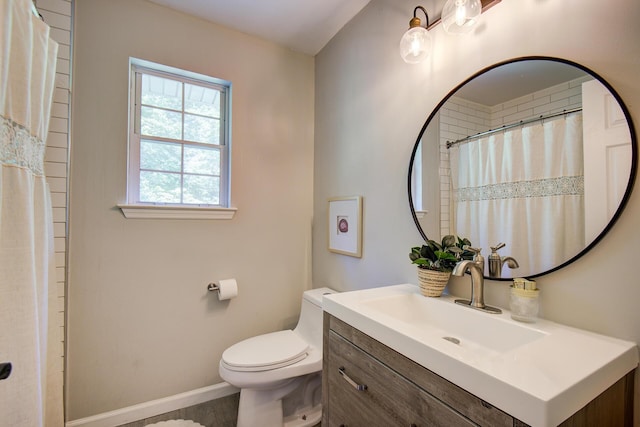 204 Stonecrest Cir, Ringgold, GA 30736 - bathroom with vanity, toilet, baseboards, and a shower with curtain