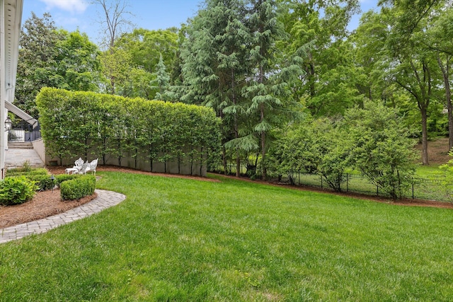 view of yard with fence