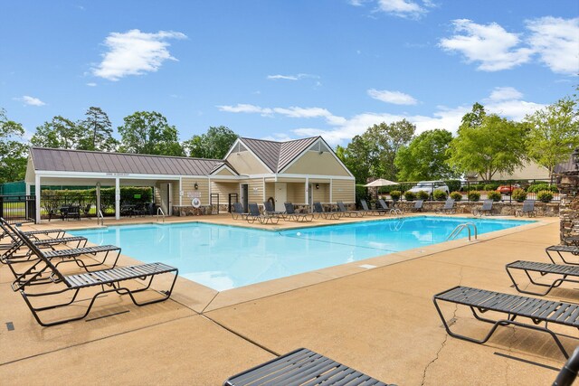 9240 Shay Cv, Ooltewah, TN 37363 - community pool featuring fence and a patio area
