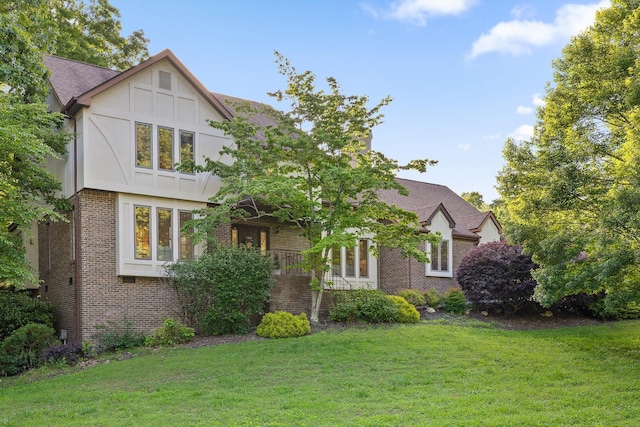 9240 Shay Cv, Ooltewah, TN 37363 - view of side of property featuring brick siding and a yard