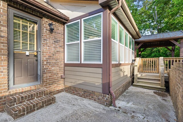 9240 Shay Cv, Ooltewah, TN 37363 - property entrance featuring brick siding