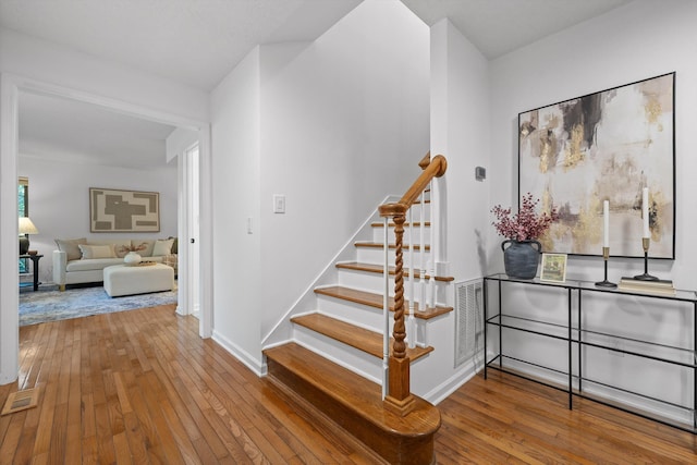9240 Shay Cv, Ooltewah, TN 37363 - stairs with hardwood / wood-style flooring and baseboards