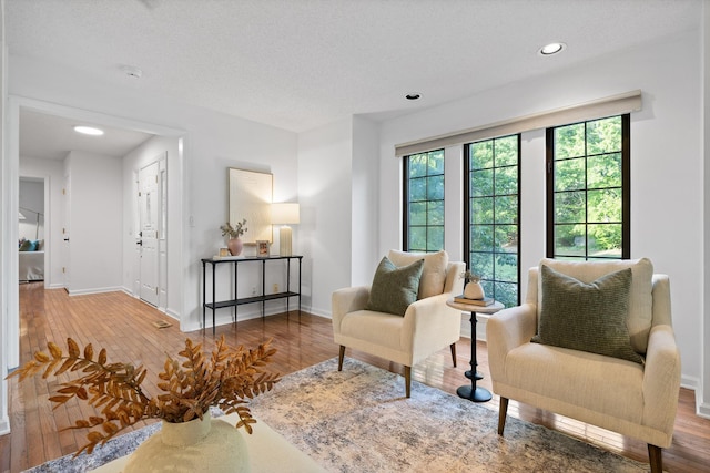 9240 Shay Cv, Ooltewah, TN 37363 - sitting room with wood finished floors, baseboards, and recessed lighting