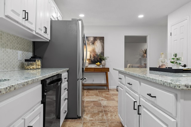 9240 Shay Cv, Ooltewah, TN 37363 - kitchen featuring black dishwasher, decorative backsplash, light stone finish flooring, recessed lighting, and white cabinets