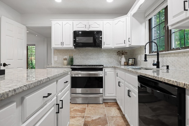 9240 Shay Cv, Ooltewah, TN 37363 - kitchen with black appliances, a sink, decorative backsplash, white cabinetry, and light stone counters