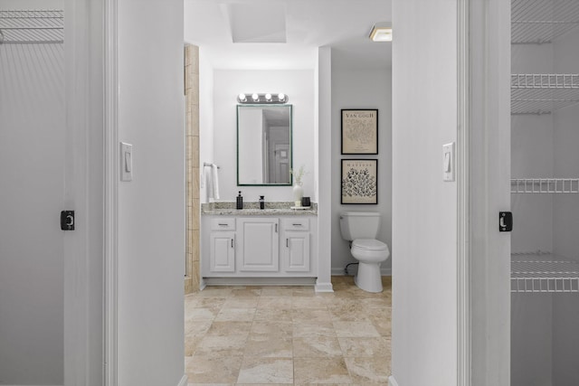 9240 Shay Cv, Ooltewah, TN 37363 - bathroom featuring toilet, vanity, and baseboards