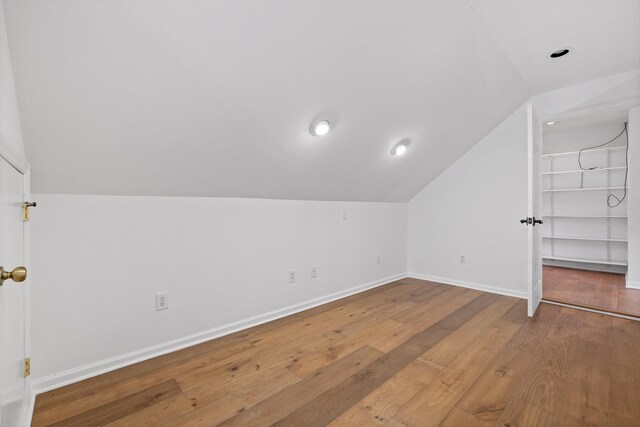 9240 Shay Cv, Ooltewah, TN 37363 - bonus room with vaulted ceiling, wood finished floors, and baseboards