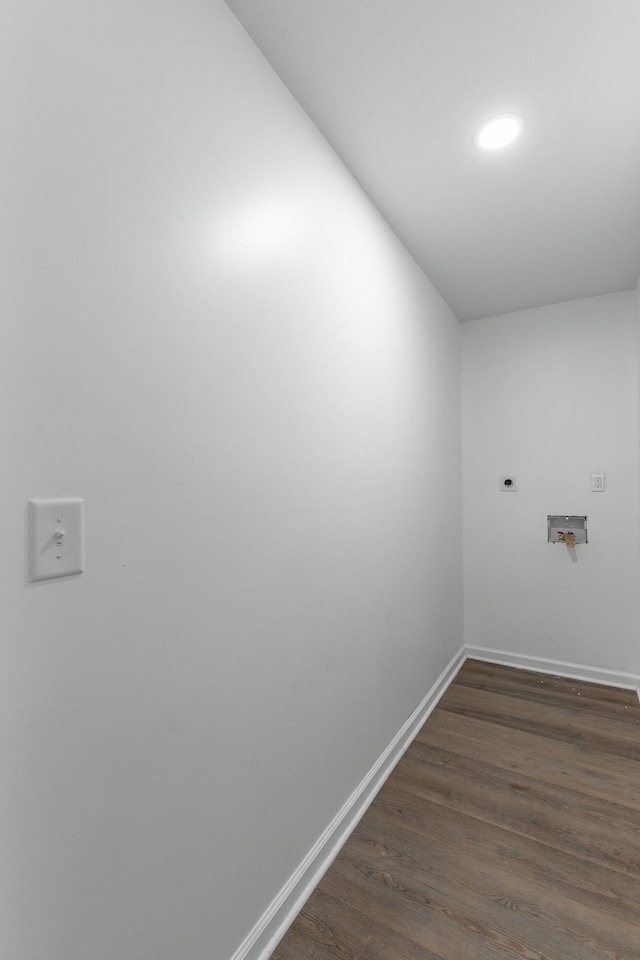 laundry area featuring laundry area, hookup for an electric dryer, hookup for a washing machine, baseboards, and dark wood-style floors