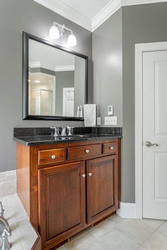 full bath featuring crown molding, visible vents, vanity, walk in shower, and tile patterned floors