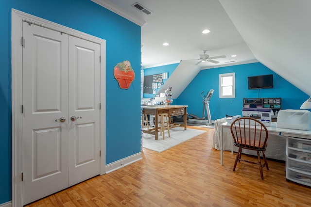 office area with baseboards, visible vents, ceiling fan, and light wood-style floors