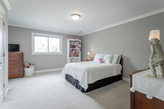bedroom with carpet flooring, baseboards, and ornamental molding