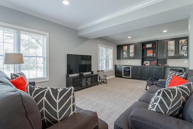 living room featuring crown molding, a dry bar, recessed lighting, and light colored carpet