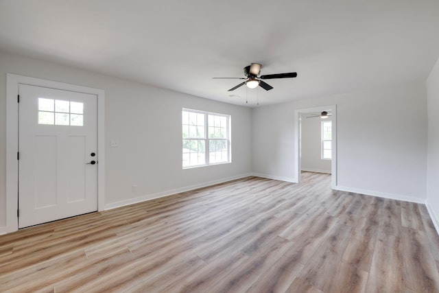 378 Warren St, Rossville, GA 30741 - foyer entrance featuring a ceiling fan, a healthy amount of sunlight, and light wood-style floors