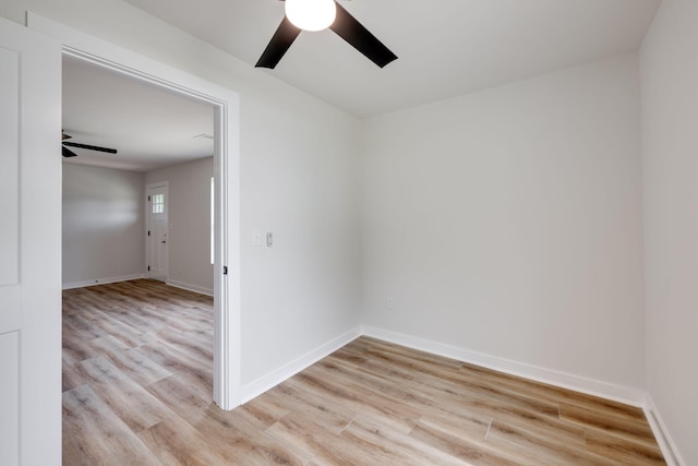378 Warren St, Rossville, GA 30741 - spare room featuring light wood-style floors, baseboards, and ceiling fan