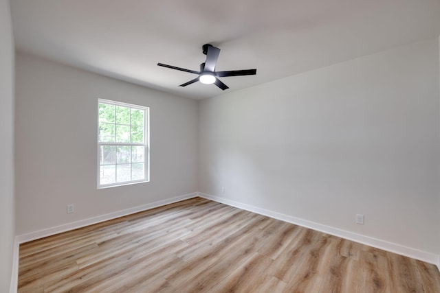 378 Warren St, Rossville, GA 30741 - empty room featuring a ceiling fan, wood finished floors, and baseboards
