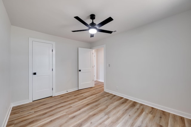 378 Warren St, Rossville, GA 30741 - unfurnished bedroom featuring light wood-type flooring, baseboards, and ceiling fan
