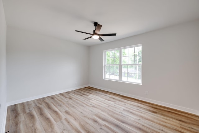 378 Warren St, Rossville, GA 30741 - unfurnished room with baseboards, ceiling fan, and wood finished floors