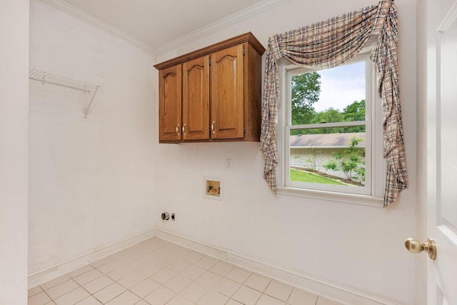 washroom with cabinet space, plenty of natural light, baseboards, and hookup for a washing machine
