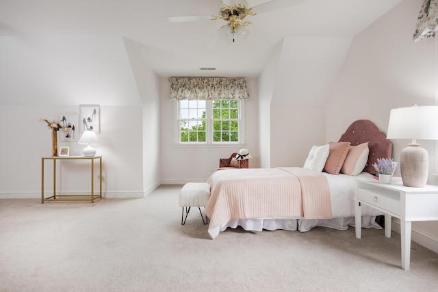 bedroom with vaulted ceiling, baseboards, a ceiling fan, and carpet floors