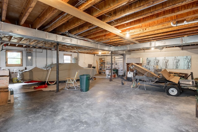 basement featuring electric panel