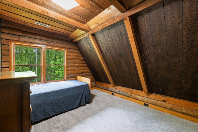 carpeted bedroom featuring vaulted ceiling, wooden ceiling, and log walls