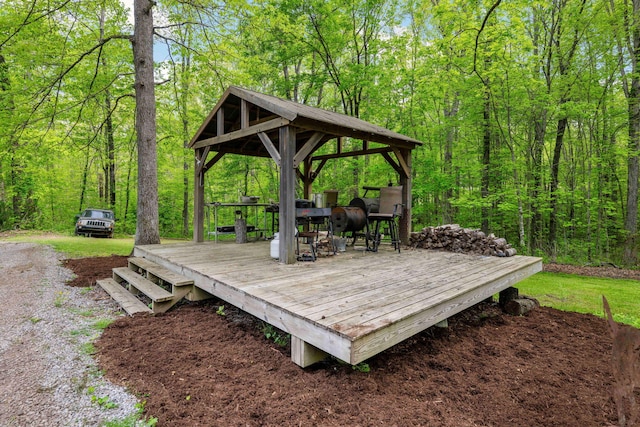 wooden deck featuring a gazebo