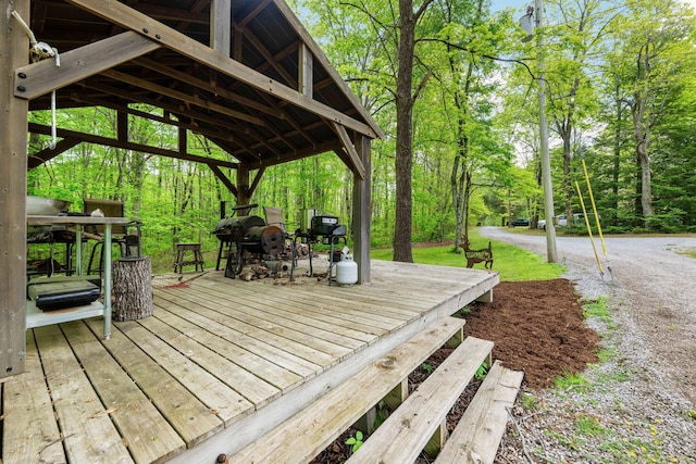 wooden terrace with a gazebo