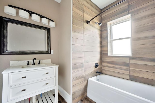 bathroom with vanity and shower / tub combination