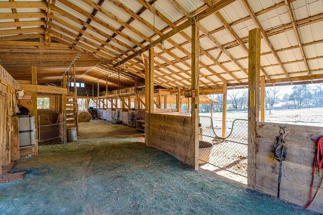 view of horse barn featuring water heater