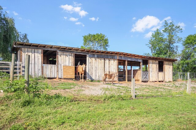 view of outbuilding with an outdoor structure and an exterior structure
