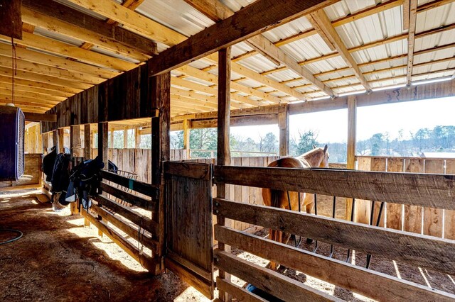 view of horse barn featuring a mountain view