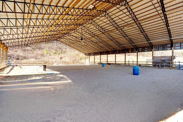 surrounding community featuring a covered structure