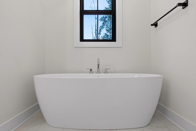 490 Moonlight Ln, Jasper, TN 37347 - bathroom with baseboards and a soaking tub