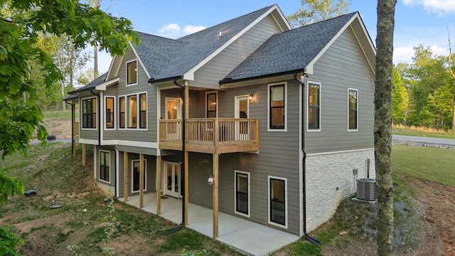 490 Moonlight Ln, Jasper, TN 37347 - back of house with a patio area, central AC, brick siding, roof with shingles, and a lawn