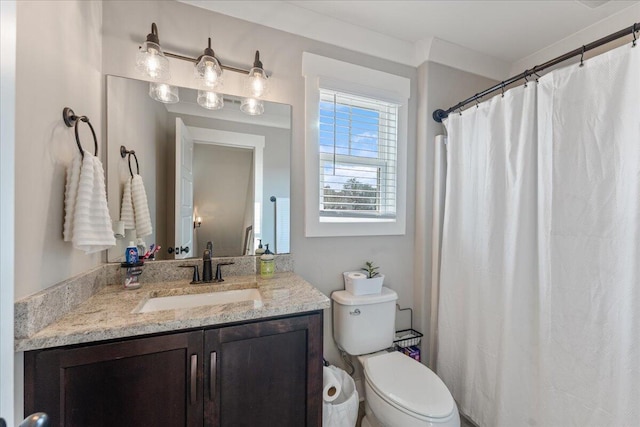 full bath with vanity and toilet