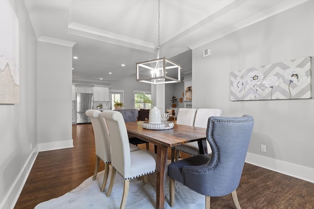 dining room featuring baseboards, recessed lighting, dark wood finished floors, and a notable chandelier