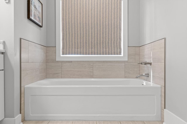 bathroom featuring a garden tub