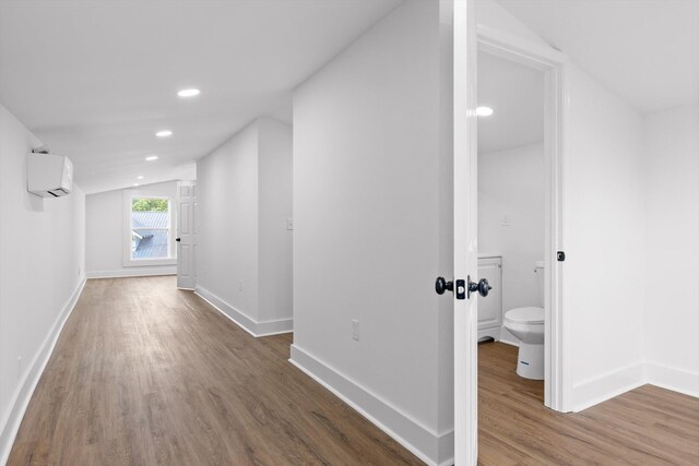 2917 Crescent Cir, Chattanooga, TN 37407 - corridor with baseboards, an AC wall unit, recessed lighting, and wood finished floors