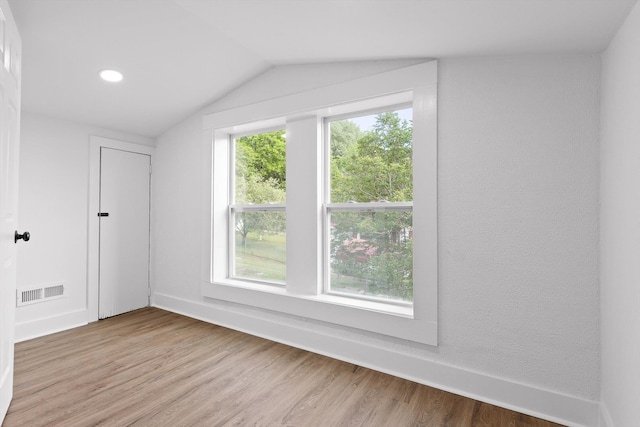 2917 Crescent Cir, Chattanooga, TN 37407 - bonus room featuring visible vents, lofted ceiling, baseboards, recessed lighting, and light wood finished floors