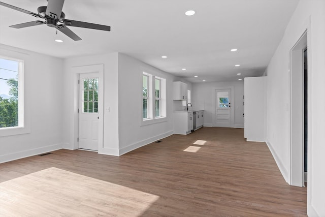 2917 Crescent Cir, Chattanooga, TN 37407 - foyer with recessed lighting, baseboards, a healthy amount of sunlight, and wood finished floors