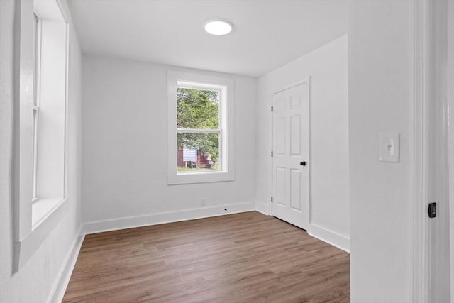 2917 Crescent Cir, Chattanooga, TN 37407 - unfurnished bedroom with baseboards and wood finished floors