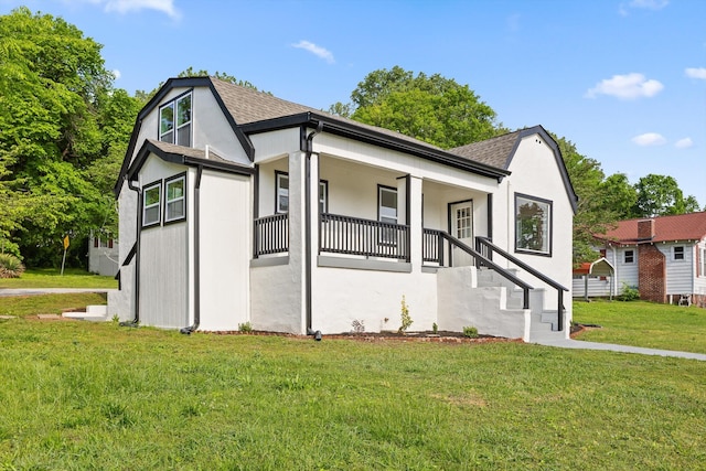 2917 Crescent Cir, Chattanooga, TN 37407 - view of front of property with a shingled roof, a front lawn, stucco siding, a porch, and stairway