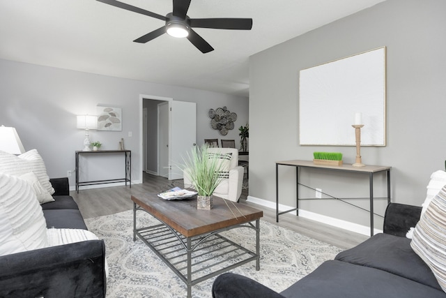 1852 N Prairie Cir, Hixson, TN 37343 - living room with wood finished floors, ceiling fan, and baseboards