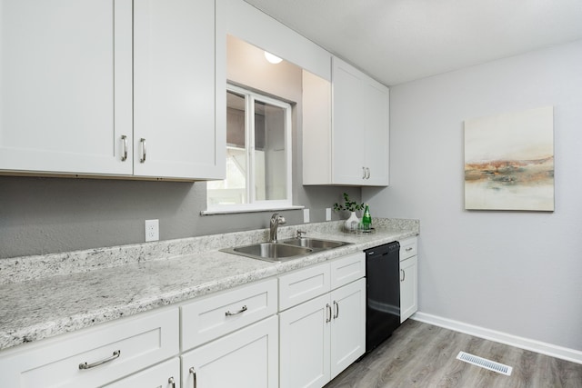 1852 N Prairie Cir, Hixson, TN 37343 - kitchen featuring a sink, black dishwasher, white cabinetry, and light wood-type flooring
