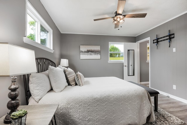 1852 N Prairie Cir, Hixson, TN 37343 - bedroom featuring wood finished floors, baseboards, ornamental molding, and ceiling fan