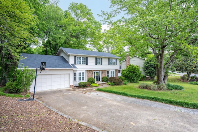view of front facade featuring a garage, concrete driveway, a front lawn, and brick siding