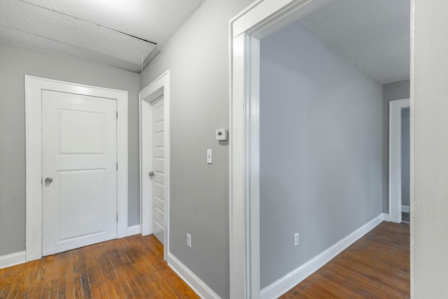 1812 John Ross Rd, Chattanooga, TN 37412 - hall featuring wood finished floors, baseboards, and a textured ceiling