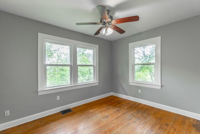 1812 John Ross Rd, Chattanooga, TN 37412 - spare room featuring baseboards, wood-type flooring, and a ceiling fan